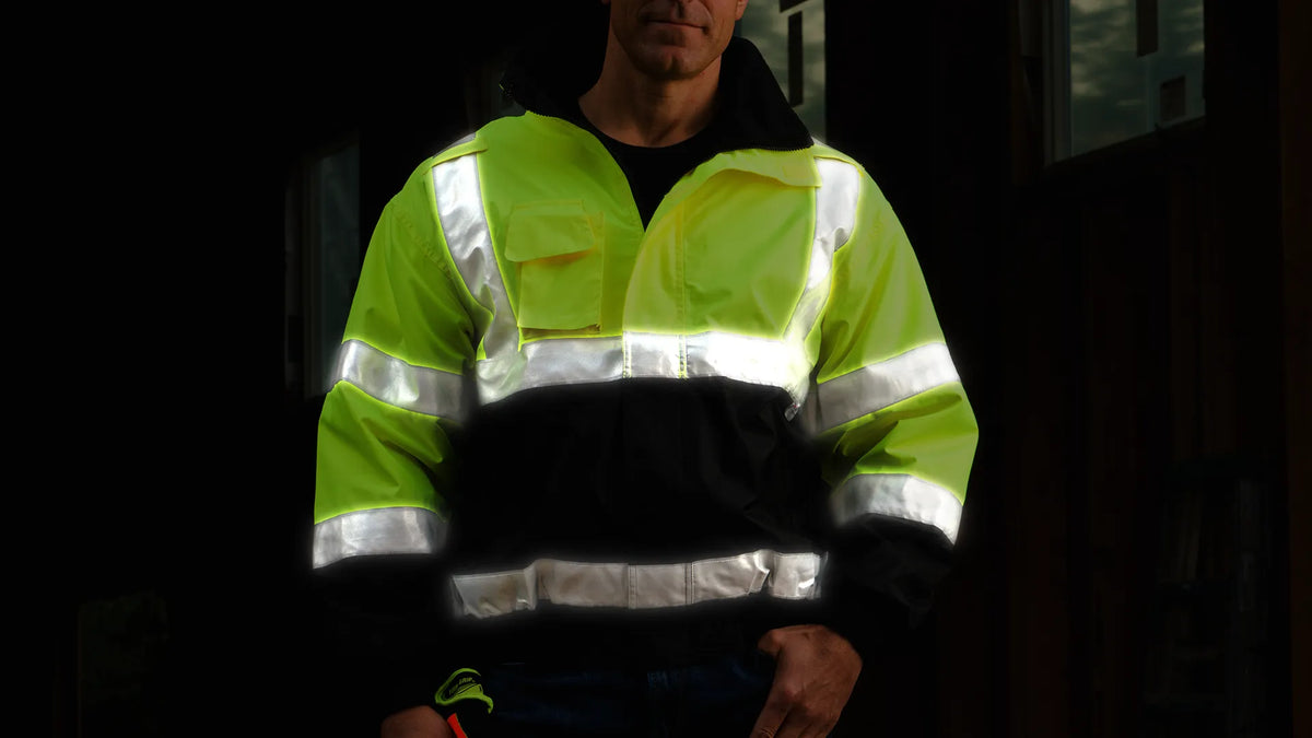 GAME 1370 hi-vis bomber at night, reflective tape lit